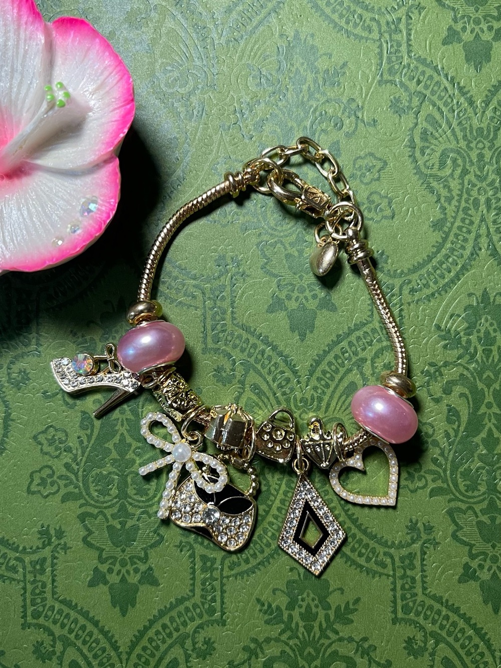 Gold-Tone Charm Bracelet with Pink Beads and Crystal Pendants